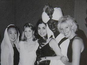 Canada’s Prime Minister Justin Trudeau, with his face and hands painted brown, poses with others during an "Arabian Nights" party when he was a 29-year-old teacher at the West Point Grey Academy in Vancouver, Canada, in this photo published in the academy’s 2000-2001 yearbook.