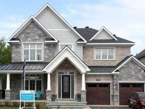 A fall photo of the Minto Dream Home that is the top prize in the CHEO Dream of a Lifetime lottery. More than 35,000 people toured the home during the campaign.