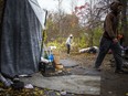 After two rooming-house fires since spring, a group of people who cannot find affordable housing have built a tent commune in a wooded area behind Bayview Station.