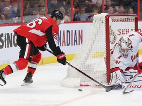 Colin White tries to wrap one past James Reimer in first period action as the Ottawa Senators take on the Carolina Hurricanes in NHL action at the Canadian Tire Centre on Saturday.