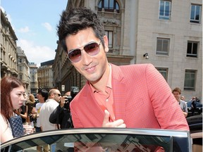 Godfrey Gao arrives at the 'Salvatore Ferragamo' show as part of Milan Fashion Week Spring/Summer 2014 on June 23, 2013 in Milan, Italy.