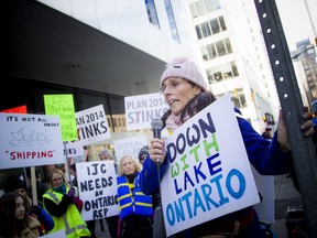 Sarah Delicate of Bowmanville, Ont., was one of the people who travelled to Ottawa for Saturday's rally at the International Joint Commission Office before making their sway to Parliament Hill to protest perceived inaction on extreme flooding and high water levels on rivers in this part of the country.