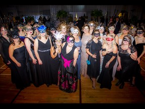 The large group of event organizers all looked beautiful in their stunning masks.