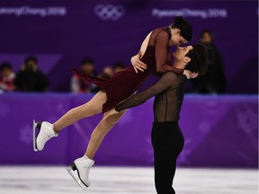 Canada's Tessa Virtue and Canada's Scott Moir compete in the ice dance free dance of the figure skating event during the Pyeongchang 2018 Winter Olympic Games at the Gangneung Ice Arena in Gangneung on February 20, 2018.