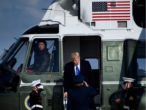 US President Donald Trump walks from Marine One to Air Force One at Andrews Air Force Base November 8, 2019, in Maryland.