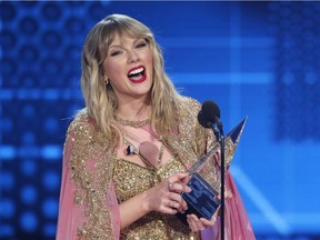Taylor Swift accepts the Artist of the Decade award.