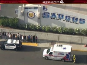 Police and emergency vehicles on the scene of a shooting at Saugus high school in Santa Clarita, California, U.S., November 14, 2019 in this screenshot taken from video footage.