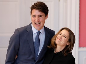 Chrystia Freeland poses with Canada's Prime Minister Justin Trudeau after being sworn-in as Deputy Prime Minister during the presentation of Trudeau's new cabinet, at Rideau Hall in Ottawa, Ontario, Canada Nov. 20, 2019.