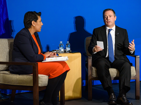 Calgary Chamber of Commerce President Sandip Lalli speaks with Alberta Premier Jason Kenney at an event on Oct 1, 2019.