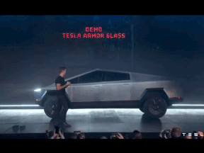 Franz von Holzhausen, head of design at Tesla, throws metal balls at the new Cybertruck on Nov. 21, 2019.