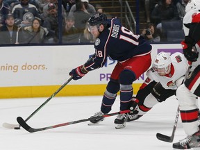 Ottawa Senators right wing Mikkel Boedker tries to poke check Columbus Blue Jackets center Pierre-Luc Dubois during the second period at Nationwide Arena.