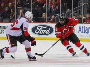 New Jersey Devils defenceman P.K. Subban (76) skates with the puck against Ottawa Senators centre Colin White (36) during the second period at Prudential Center.