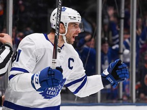 Toronto Maple Leafs centre John Tavares (91) celebrates after scoring a goal against the  New York Islanders during the third period at Nassau Veterans Memorial Coliseum.