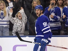 Toronto Maple Leafs forward John Tavares (91) celebrates after scoring the winning goal against the Buffalo Sabres in overtime at Scotiabank Arena.