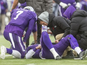 Mustangs quarterback and league MVP Chris Merchant lies injured on the turf after being sacked during the Yates Cup against the McMaster Marauders on Saturday November 9, 2019. Merchant was hobbled early by a bad ankle and the sack took him out of game, until returning to run the Mustangs final series after the game was lost 29-15. Mike Hensen/The London Free Press/Postmedia Network