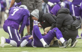 Mustangs quarterback and league MVP Chris Merchant lies injured on the turf after being sacked during the Yates Cup against the McMaster Marauders on Saturday November 9, 2019. Merchant was hobbled early by a bad ankle and the sack took him out of game, until returning to run the Mustangs final series after the game was lost 29-15. Mike Hensen/The London Free Press/Postmedia Network