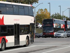 Double-decker buses near Hurdman station in October.
