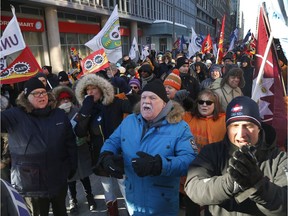 PSAC members rally  on Laurier Avenue in February 2019 to demand action from the federal government to fix the Phoenix pay system.