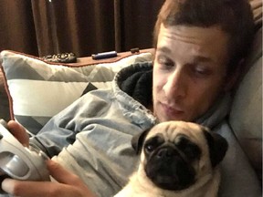 A photo of Damian Sobieraj and his dog, Rosie, from a GoFundMe campaign page.