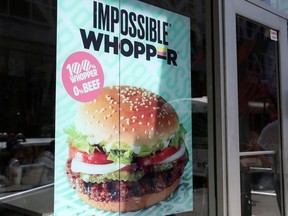 A sign advertising the soy based Impossible Whopper is seen outside a Burger King in New York, U.S., Aug. 8, 2019.
