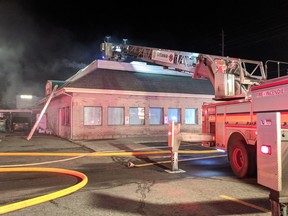 Fire heavily damaged the Sushi Kan restaurant on Innes Road early Wednesday.