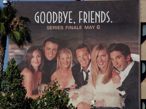 The cast of the popular comedy television series "Friends"  are pictured on a giant billboard promoting the series finale in 2004.