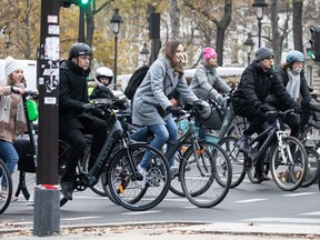 Commuters ride bicycles during a national strike in Paris, France, on Thursday, Dec. 5, 2019.