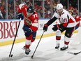 Chris Tierney (right) of the Ottawa Senators pursues Frank Vatrano of the Florida Panthers as he clears the puck from behind the net at the BB&T Center on Monday.