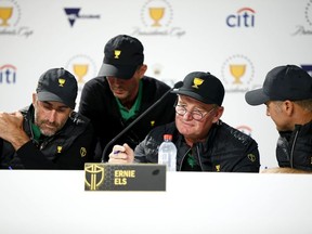 Captain Ernie Els of South Africa and the International team and Assistant Captain K.J. Choi of South Korea and the International team, Assistant Captain Geoff Ogilvy of Australia and the International team, Assistant Captain Mike Weir of Canada and the International team and Assistant Captain Trevor Immelman of South Africa and the International team take part in picking Thursday's Four-Ball Pairings ahead of the 2019 Presidents Cup at Royal Melbourne Golf Course on December 11, 2019 in Melbourne, Australia.