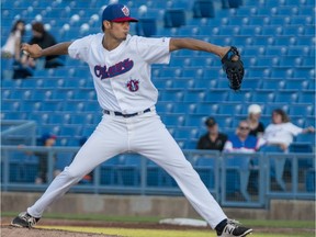 Ottawa Champions pitcher Jordan Kurokawa delivers a pitch against the Rockland Boulders during a game at RCGT Park on July 15, 2019.