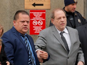 Harvey Weinstein exits following a hearing in his sexual assault case at New York State Supreme Court in New York, U.S., December 6, 2019.