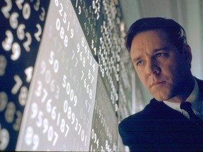 John Nash (Russell Crowe) secretly works as an enemy code breaker in a scene from A Beautiful Mind.