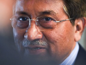 In this file photo taken on November 14, 2014 Pakistan's former military ruler General Pervez Musharraf smiles during an interview with AFP in Karachi.