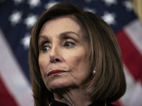 Speaker of the House Nancy Pelosi (D-CA) looks on during a press conference after the House of Representatives voted to impeach President Donald Trump at the U.S. Capitol on December 18, 2019 in Washington, DC.