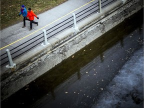 Two women out for a walk along the Rideau Canal.