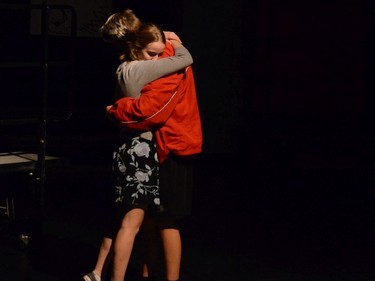 Gabriella Montez, played by Emma Connelly (L), and Troy Bolton, played by Brenden MacGowan (R), during All Saints Catholic High School's production of High School Musical, on Nov. 29, 2019, in Ottawa, On.