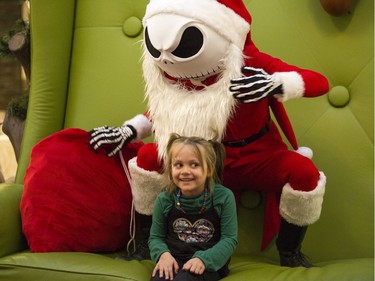 Fans, like 5 year old Indie Myles, of the movie "The Nightmare Before Christmas", featuring the character Jack Skellington, lined up for over two hours at Carlingwood Shopping Centre to have a picture or two taken with the Tim Burton character. The marketing manager at Carlingwood Nathalie Lavergne came up with the idea to help raise funds for the food bank while drawing customers to the mall on what is normally a slow day of the week.