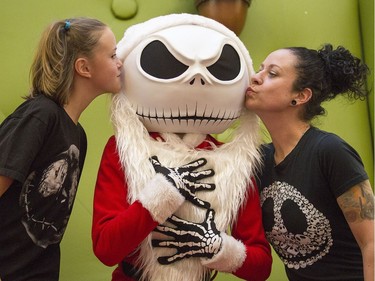 Fans, like Juliette Legault, 10, and her mom Gen Legault, of the movie "The Nightmare Before Christmas", featuring the character Jack Skellington, lined up for over two hours at Carlingwood Shopping Centre to have a picture or two taken with the Tim Burton character. The marketing manager at Carlingwood Nathalie Lavergne came up with the idea to help raise funds for the food bank while drawing customers to the mall on what is normally a slow day of the week.