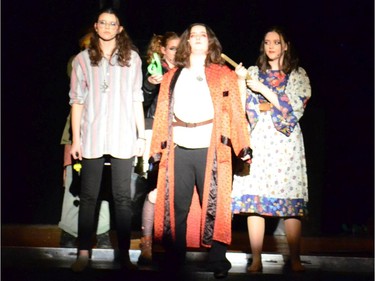 A Lost Boy played by Alissa Trottier(L), Mr. Smee played by Nicky Burt (2ndFL), Tink played by Bree Mollison (3rdFL), Hook played by Emma Langlois (2ndFR), and The Tiger Lily played by Maya Brown (R), during Cairine Wilson Public High School's Cappies production of Peter And Wendy, held on December 3, 2019 in Ottawa, On.