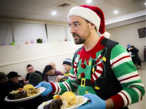 Sam Robinson volunteered at the Salvation Army Community Christmas Dinner held on Saturday.