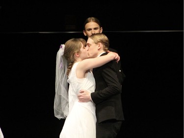 Greer Truelove, performs as Emily Webb (L) and Carlos Sanchez, performs as George Gibbs (R), during St. Mark High School's Cappies production of the play Our Town, on December, 14, 2019,