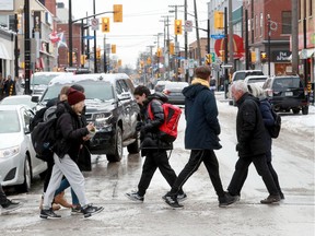 Ottawa mayor Jim Watson, along with city councillor Catherine McKenney and others from city hall, local businesses and the "I Dig Elgin" group, officially re-opened Elgin Street to two-way traffic Monday (Dec. 16, 2019). The busy downtown artery, which has been closed for construction for months, re-opened between Laurier Avenue West and Catherine Street to the delight of locals and local business owners.  Julie Oliver/Postmedia