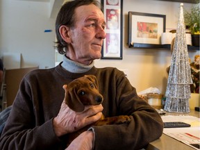 Richard Larocque and his dachshund puppy Max survived a cottage fire recently. December 19, 2019. Errol McGihon/Postmedia