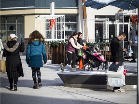 Shoppers trundle about at the Tanger Outlets mall in Ottawa's west end on Saturday.