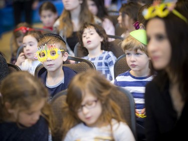 Six-year-old Isaac Lew wore his menorah glasses during the event Sunday.