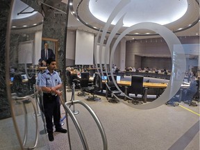 Council chambers are seen from outside the glass doors during a weekly Ottawa city council meeting in Andrew S. Haydon Hall.