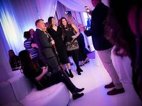 From left: Peter Angione, Deneen Perrin, Joanne Woo and Lianne Laing take a moment for a photo in the bubbles lounge.
