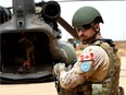 A Canadian UN soldier prepares to move out of a base in Gao on Aug. 1, 2018, as part of an operation in Mali. Canada declined a request to extend its presence there.