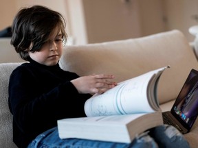 Belgian student Laurent Simons, 9 years old at his home on November 21, 2019 in Amsterdam. - Laurent Simons is studying electrical engineering at the Eindhoven University of Technology and is on course to finish his degree in December.