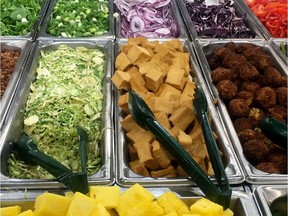 Tofu along with other vegetarian food is viewed at a store.